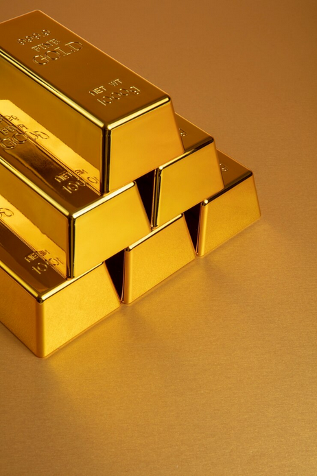 Stacked gold bars representing wealth preservation